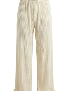 Beige pleated pants on a white background