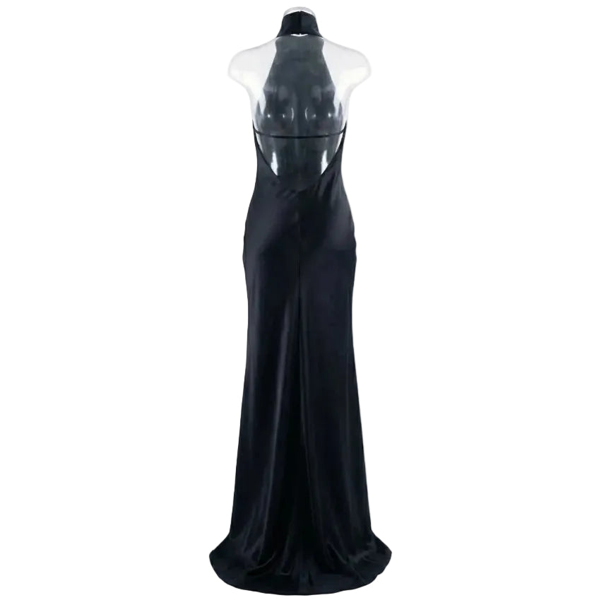 Black evening gown on a mannequin against a white background