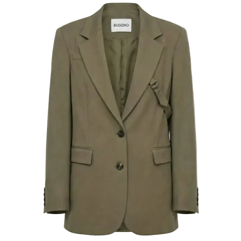 Green blazer with a visible brand label on a white background