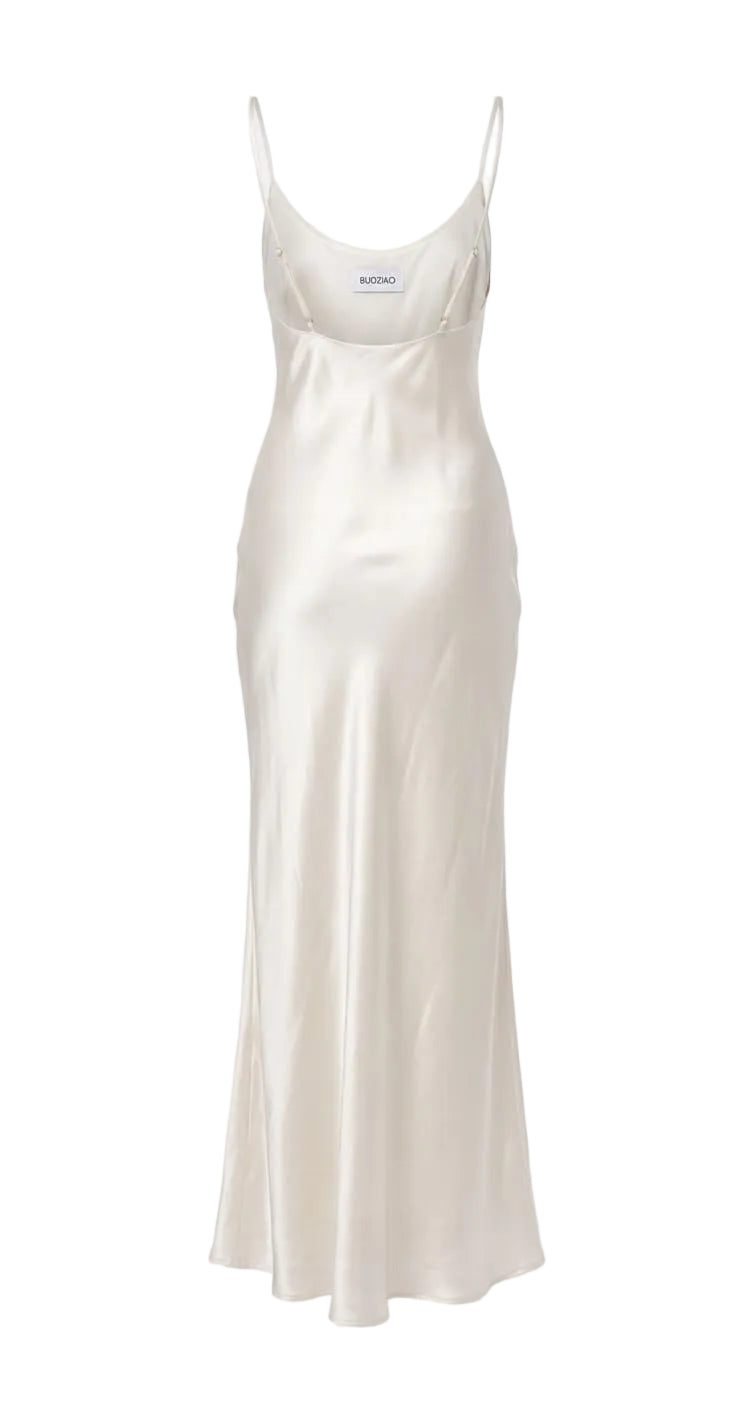 White satin slip dress on a white background