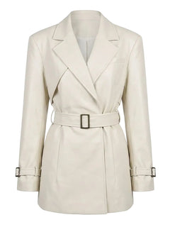 Beige trench coat with a belt on a white background
