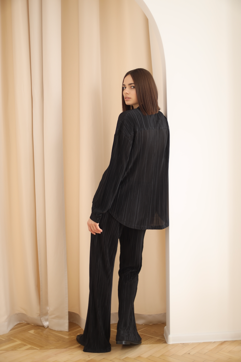 black pleated pants
