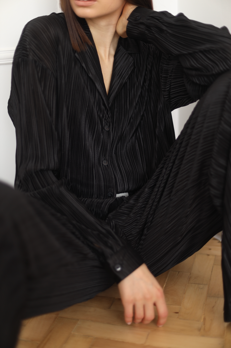 black pleated shirt