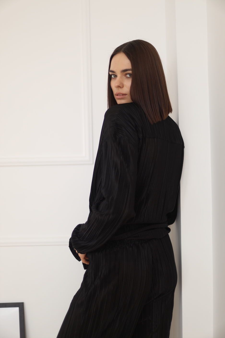 black pleated pants