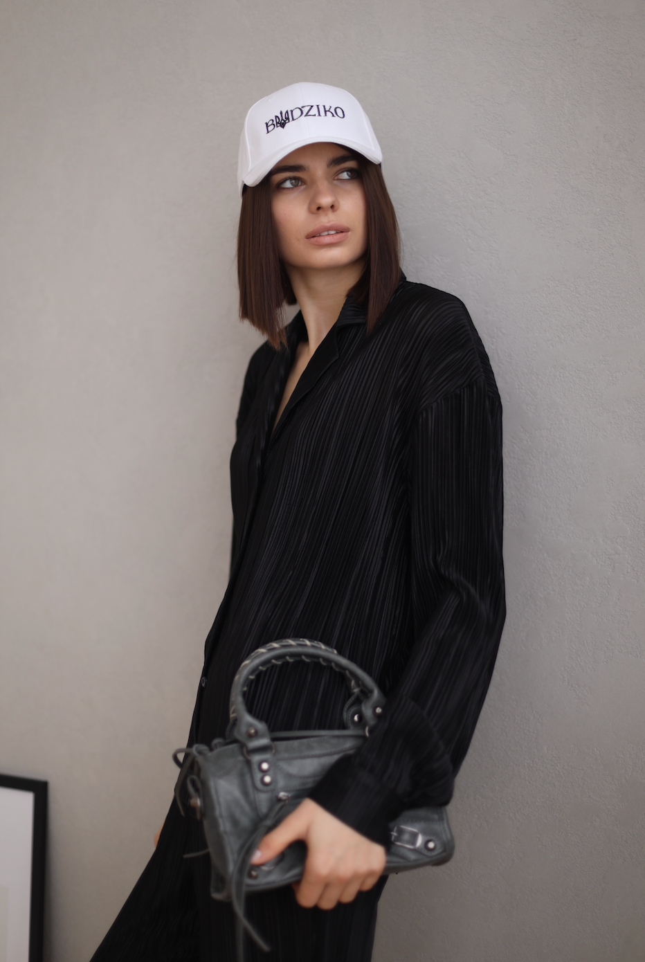 black pleated shirt