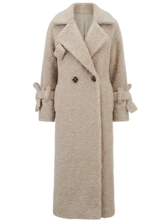 Beige teddy coat with a collar on a white background