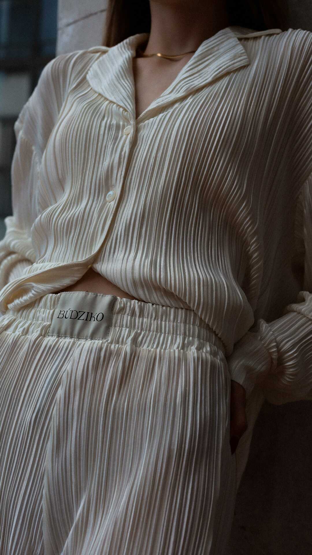 milky white pleated shirt