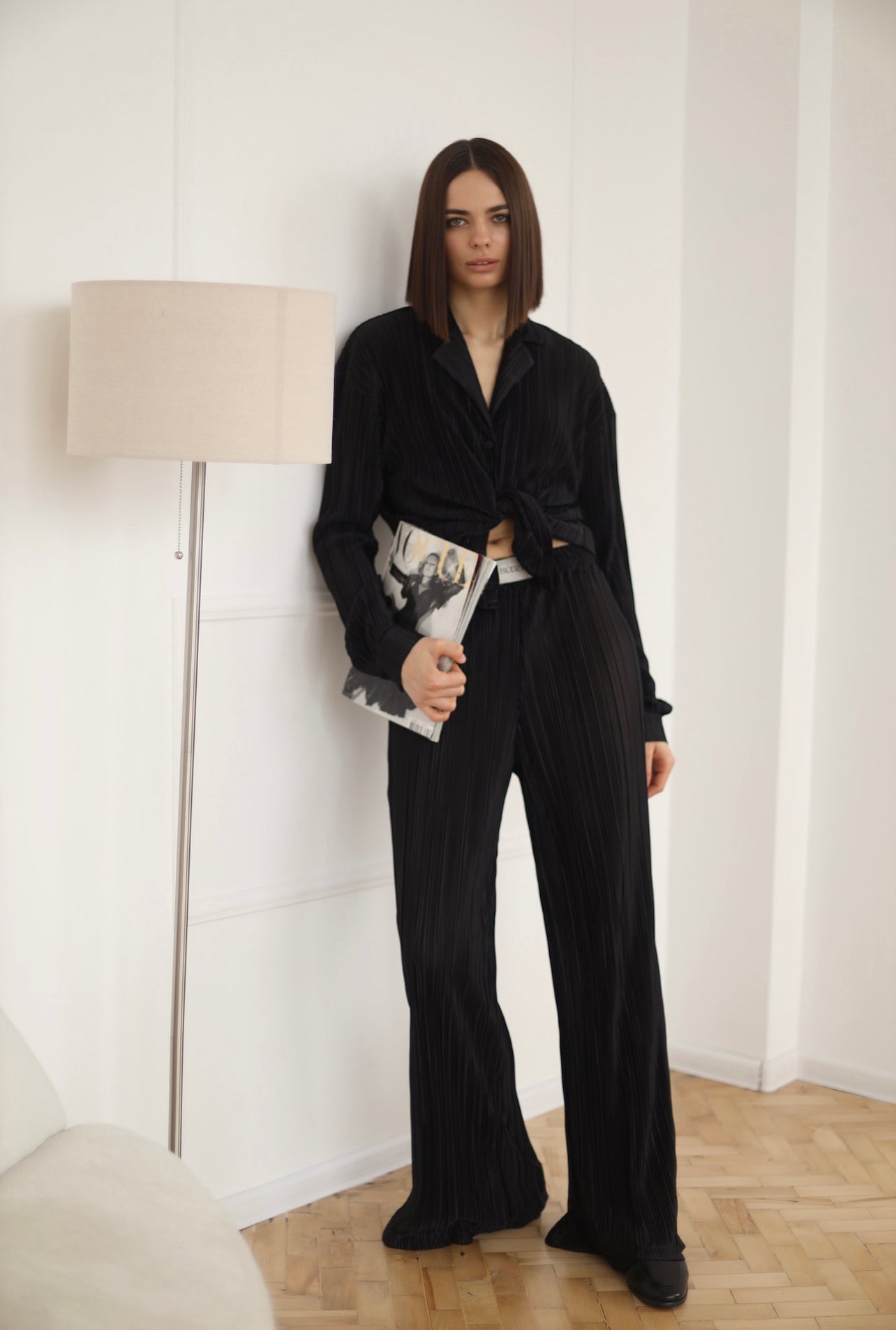 black pleated shirt