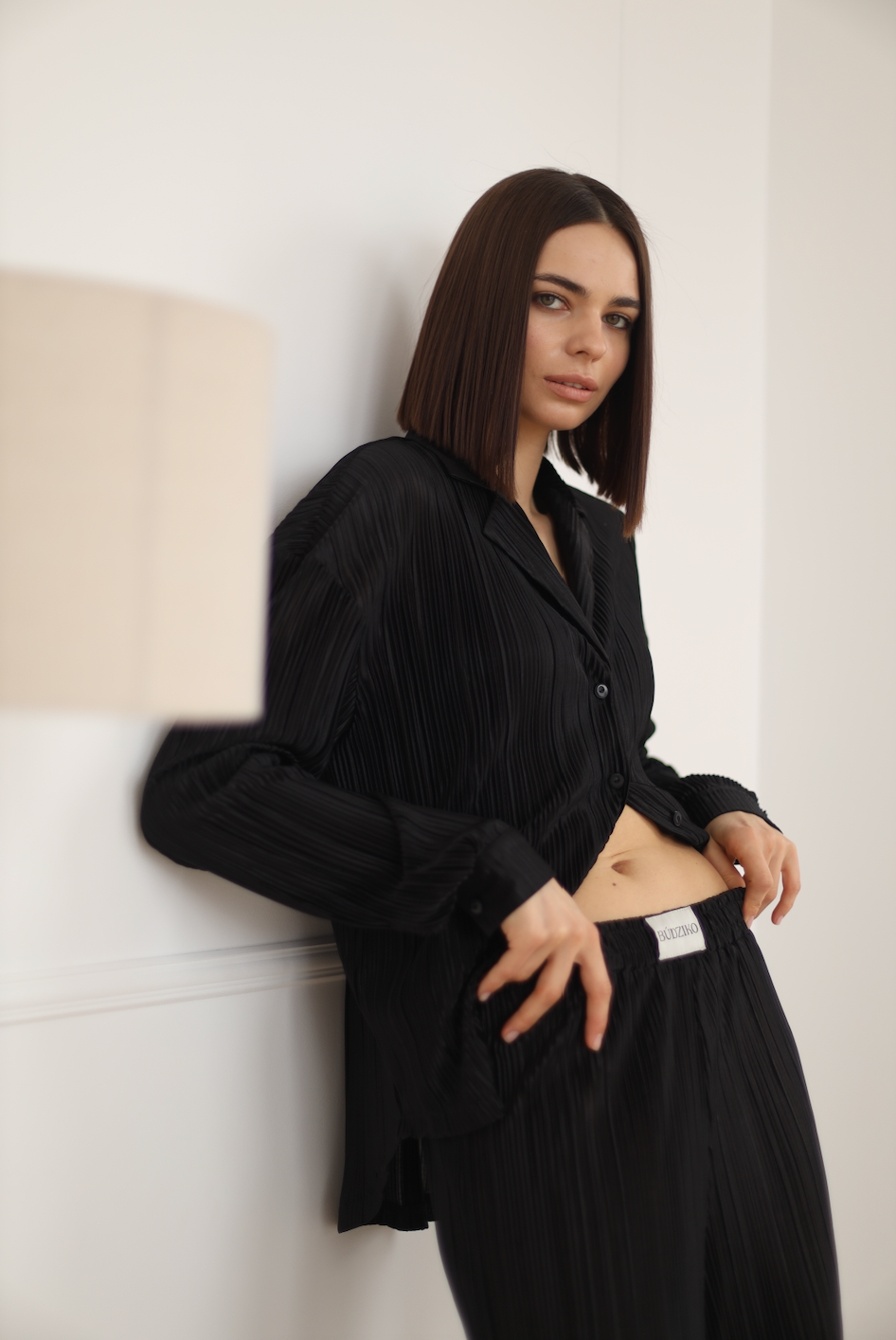 black pleated pants
